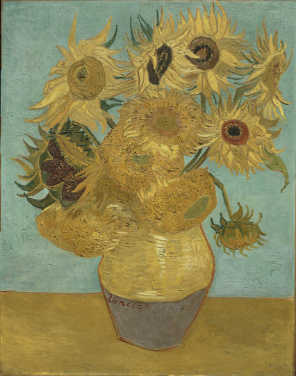 A duller (though likely more accurate to the current reality of the work on the wall) version of the same painting of sunflowers in a vase.