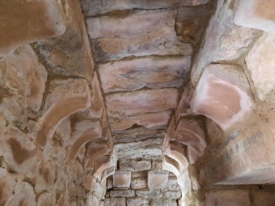 Ancient masonry on a hall ceiling inside the chateau