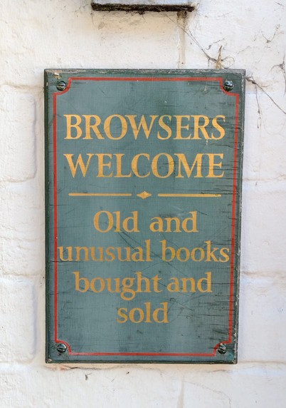 Wall plate notice. Gold letteing on a sage green background.