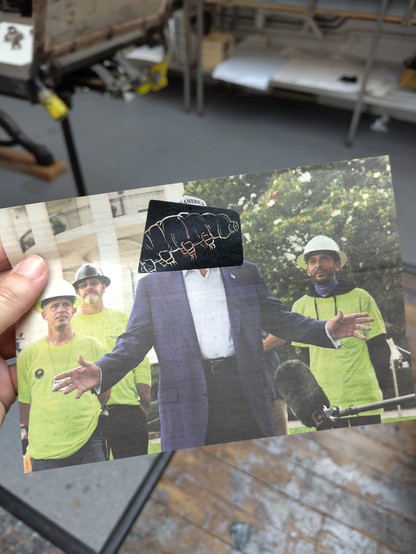 Cut out bit of newspaper with photo of trump, and a wood engraving print of a tardigrade over his face