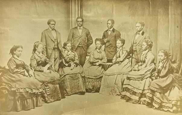 The Fisk Jubilee Singers. From left to right, the portrait shows Georgia Gordon, Mabel Lewis, Edmund Watkins, Maggie L. Porter, Isaac P. Dickerson, Jennie Jackson, Benjamin Holmes, Ella Sheppard, Thomas Rutling, Julia Jackson and Minnie Tate