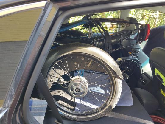 opgevouwen trike in de auto