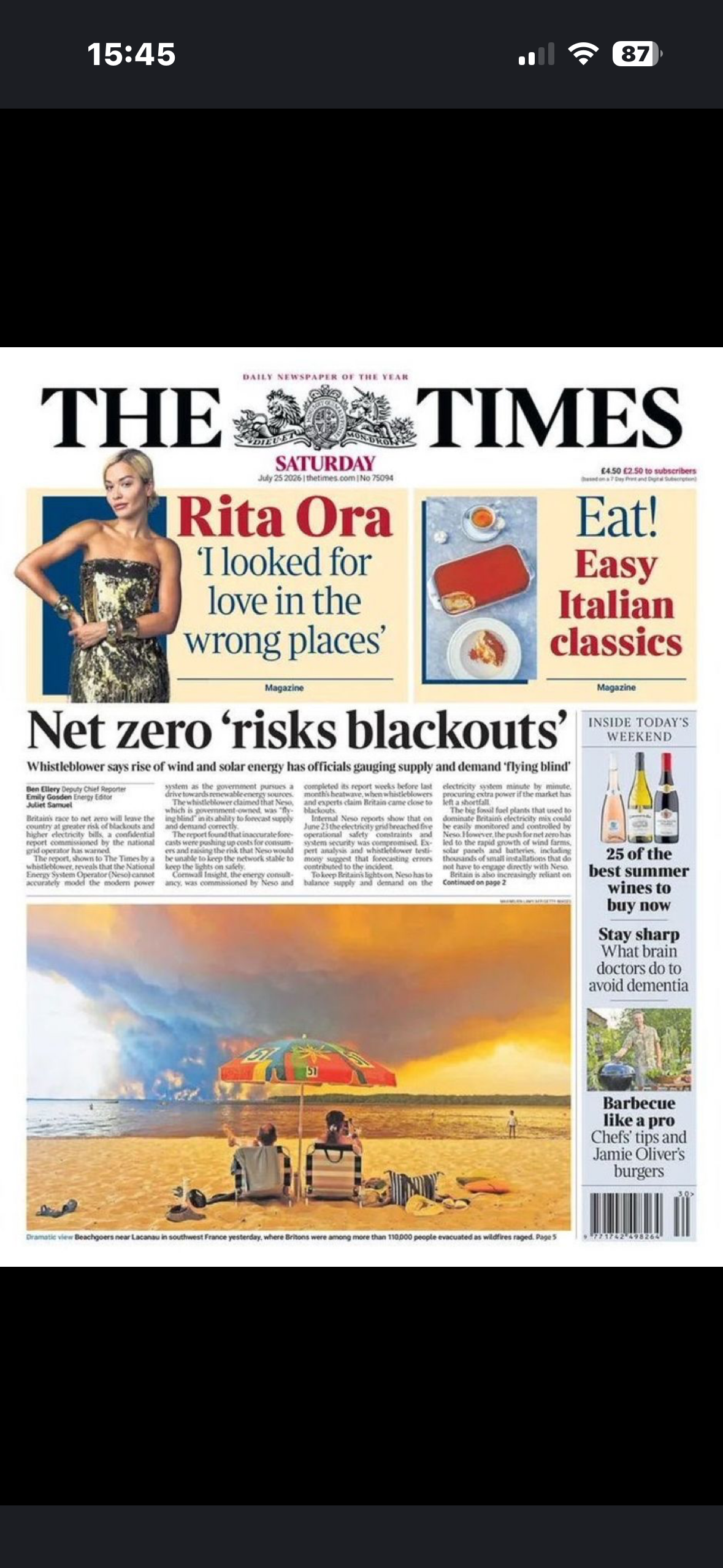 Screenshot of front page of Times today. One article against net zero; beneath a picture of wildfires in france